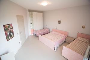 A bed or beds in a room at Casa Vacanza Dal Cavaliere