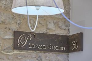 Certifikát, hodnocení, plakát nebo jiný dokument vystavený v ubytování Piazza Duomo 36