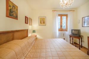 En eller flere senge i et værelse på D'Annunzio 26 Art House