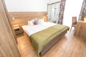 Voodi või voodid majutusasutuse Hotel Andres toas