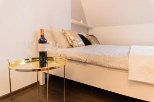 Posteľ alebo postele v izbe v ubytovaní GoldenEye Apartment Center