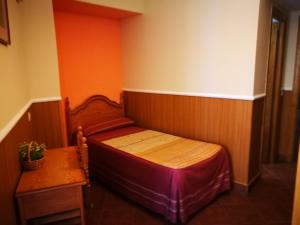 
Cama o camas de una habitación en Hostal Hueso
