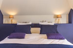 Chambres "Le Tirel "客房内的一张或多张床位