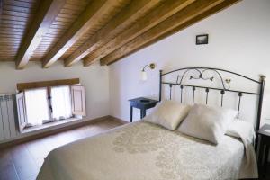 Cama o camas de una habitación en Hotel Rural La Puebla