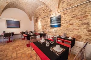 Restauracja lub miejsce do jedzenia w obiekcie Hotel Sorella Luna