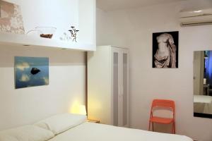 Posteľ alebo postele v izbe v ubytovaní La Casa del Fotografo
