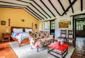 Ένα ή περισσότερα κρεβάτια σε δωμάτιο στο Casa San Nicolas