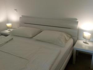 Posteľ alebo postele v izbe v ubytovaní Villa Ivana