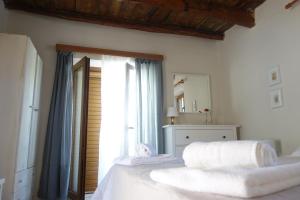 מיטה או מיטות בחדר ב-Villa Eleni