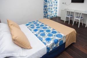 Postel nebo postele na pokoji v ubytování Casa Restino