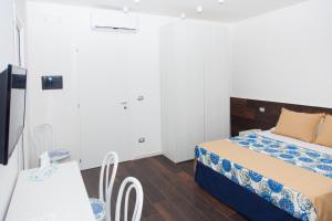 Postel nebo postele na pokoji v ubytování Casa Restino