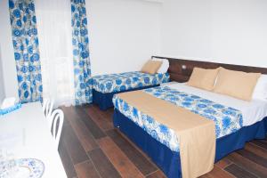 Postel nebo postele na pokoji v ubytování Casa Restino
