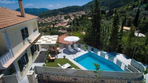 an aerial view of a house with a swimming pool at Villa Amolena in Kariá +71 photos