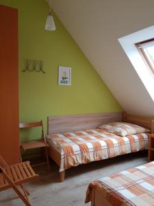 Postel nebo postele na pokoji v ubytování Über dem Meer + 16 fotografií