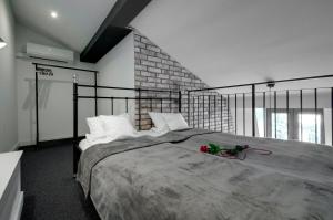 Łóżko lub łóżka w pokoju w obiekcie Zamkowa15 Apartments