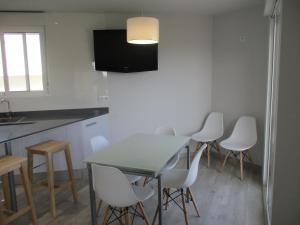 TV/trung tâm giải trí tại Apartamento Playa Sur Inmomart