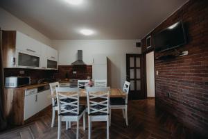 Kuchyň nebo kuchyňský kout v ubytování Apartman Vejama