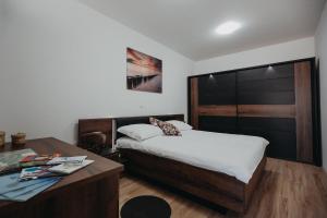 Postel nebo postele na pokoji v ubytování Apartman Vejama