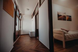 Postel nebo postele na pokoji v ubytování Apartman Vejama