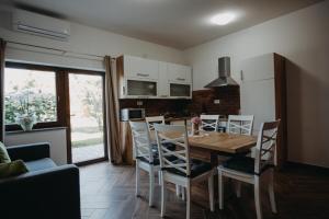 Kuchyň nebo kuchyňský kout v ubytování Apartman Vejama + 37 fotografií