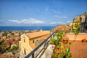 a view of a city from a balcony at Alla Chiazzetta Calabria in Amantea