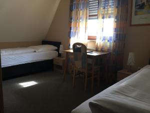 Postel nebo postele na pokoji v ubytování Hotel-Gasthof "Alter Ritter"