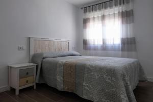 Giường trong phòng chung tại El Ventanal de Almagro