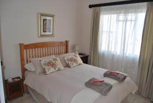 En eller flere senge i et værelse på Platbakkies Farm Retreat