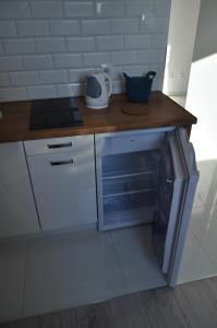 Kuchnia lub aneks kuchenny w obiekcie Apartament Wrzos