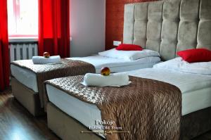 Posteľ alebo postele v izbe v ubytovaní Lublin Old Town Rooms
