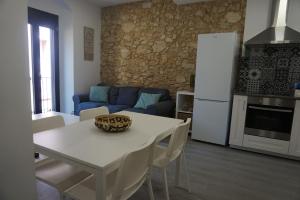Kuchyň nebo kuchyňský kout v ubytování BOREAS Apartaments
