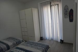 Postel nebo postele na pokoji v ubytování BOREAS Apartaments