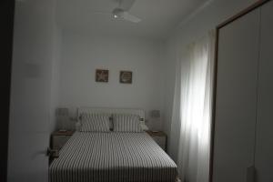 Postel nebo postele na pokoji v ubytování BOREAS Apartaments