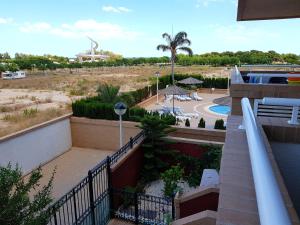 Bazén v ubytování Apartamentos Jardines del Mar II nebo v jeho okolí