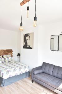 Postel nebo postele na pokoji v ubytování Au Studio 36 Arras avec parking privé