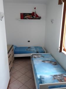 Postel nebo postele na pokoji v ubytování Al Cappellino + 14 fotografií