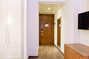 TV a/nebo společenská místnost v ubytování Dña Monse Hotel Spa & Golf