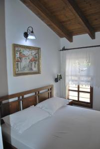 Llit o llits en una habitació de Hotel Boutique Osumi