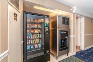 a vending machine with food and drinks in a room at Red Lion Hotel Rosslyn Iwo Jima in Arlington