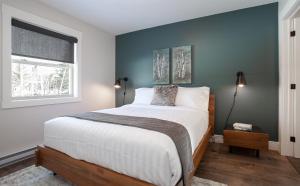 Llit o llits en una habitació de Indian Falls Chalets