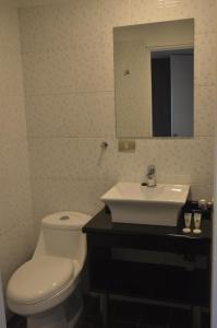 Ванная комната в Origen Apart-Hotel