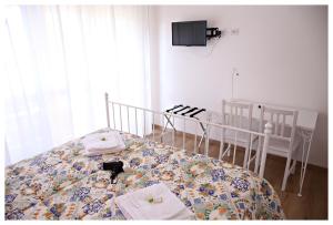 Posteľ alebo postele v izbe v ubytovaní Tosca B&B