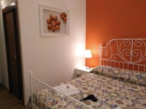 Posteľ alebo postele v izbe v ubytovaní Tosca B&B