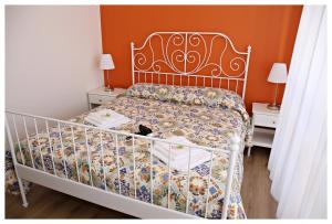 Posteľ alebo postele v izbe v ubytovaní Tosca B&B