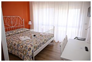 Posteľ alebo postele v izbe v ubytovaní Tosca B&B