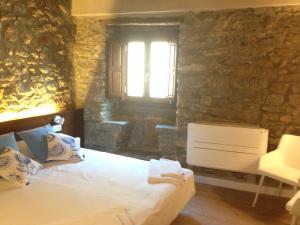 Postel nebo postele na pokoji v ubytování Cal Matiner Casa Rural ***