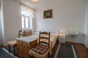 Posteľ alebo postele v izbe v ubytovaní Apartments Josip by the sea