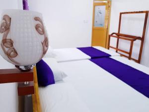 Voodi või voodid majutusasutuse SNP Star Guest House toas