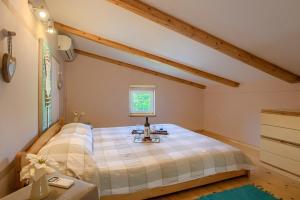 Postel nebo postele na pokoji v ubytování Holiday Home Michelle
