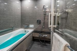 Koupelna v ubytování Tomoya Residence Hotel Kyoto